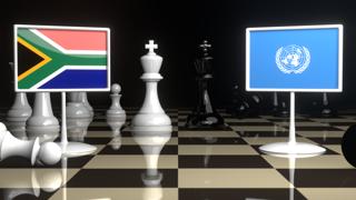 Republic-of-South-Africa National Flag, Flags placed on a chessboard with the UN flag in the background