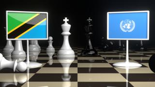 Tanzania National Flag, Flags placed on a chessboard with the UN flag in the background