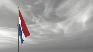 Netherlands National Flag, The national flag and flagpole visible from afar against a black and white sky background