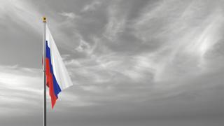 Russia National Flag, The national flag and flagpole visible from afar against a black and white sky background