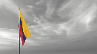 Venezuela National Flag, The national flag and flagpole visible from afar against a black and white sky background