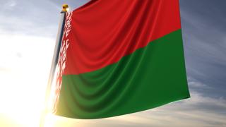 Belarus National Flag, A fluttering flag and flagpole seen up close against a dark blue sky