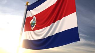 Costa-Rica National Flag, A fluttering flag and flagpole seen up close against a dark blue sky