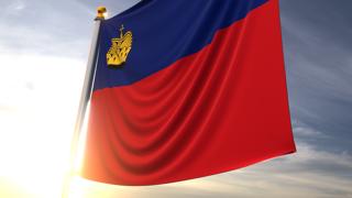 Liechtenstein National Flag, A fluttering flag and flagpole seen up close against a dark blue sky