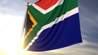 Republic-of-South-Africa National Flag, A fluttering flag and flagpole seen up close against a dark blue sky