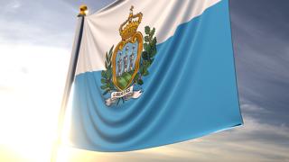 San-Marino National Flag, A fluttering flag and flagpole seen up close against a dark blue sky