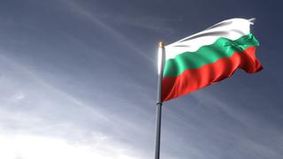 Bulgaria National Flag, The national flag and flagpole looking up against a dark blue sky