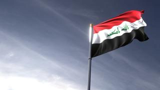 Iraq National Flag, The national flag and flagpole looking up against a dark blue sky