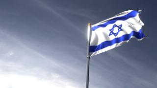 Israel National Flag, The national flag and flagpole looking up against a dark blue sky