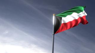 Kuwait National Flag, The national flag and flagpole looking up against a dark blue sky