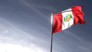 Peru National Flag, The national flag and flagpole looking up against a dark blue sky