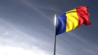 Romania National Flag, The national flag and flagpole looking up against a dark blue sky