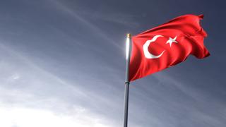 Turkiye National Flag, The national flag and flagpole looking up against a dark blue sky