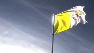 Vatican National Flag, The national flag and flagpole looking up against a dark blue sky