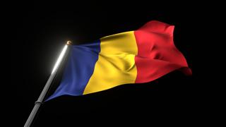 Romania National Flag, A fluttering national flag and flagpole viewed from below on a black background