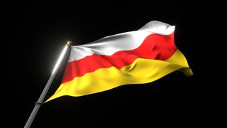 South-Ossetia National Flag, A fluttering national flag and flagpole viewed from below on a black background