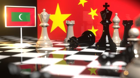 モルディブ国旗, 中国の国旗を背景にチェス盤に置かれた国旗