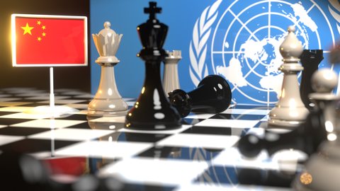 China National Flag, Flags placed on a chessboard with the UN flag in the background