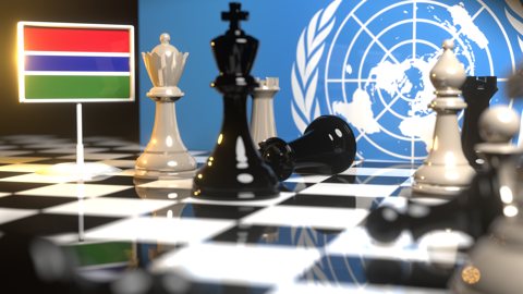 Gambia National Flag, Flags placed on a chessboard with the UN flag in the background