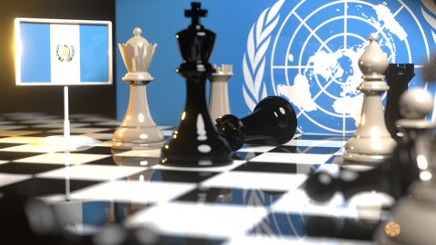 Guatemala National Flag, Flags placed on a chessboard with the UN flag in the background