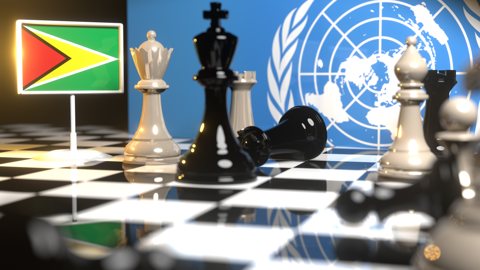 Guyana National Flag, Flags placed on a chessboard with the UN flag in the background