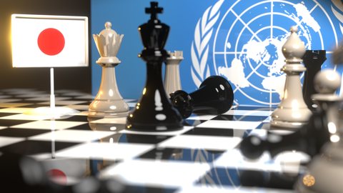 Japan National Flag, Flags placed on a chessboard with the UN flag in the background