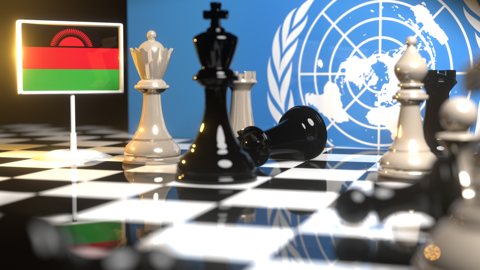 Malawi National Flag, Flags placed on a chessboard with the UN flag in the background