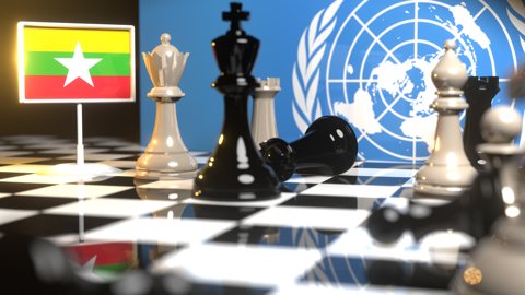 Myanmar National Flag, Flags placed on a chessboard with the UN flag in the background